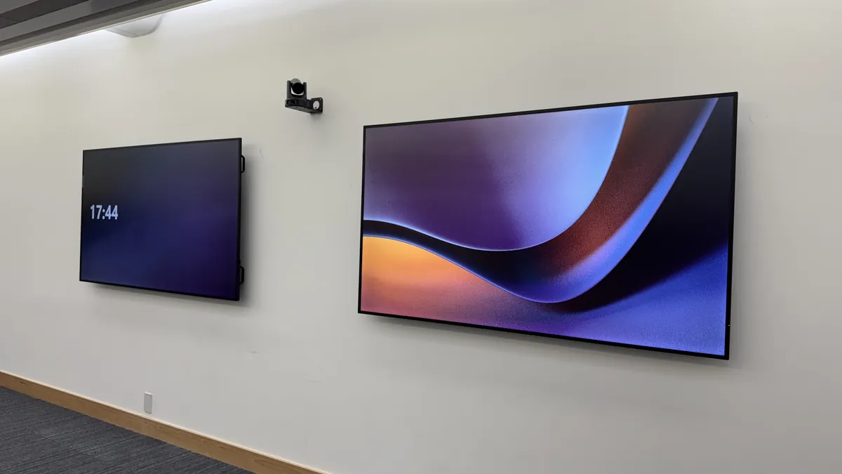 Screens installed by AV Xpert in a large meeting space
