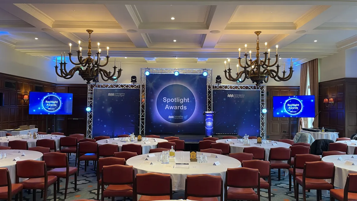 Staging and lighting set up by AV Xpert for an awards dinner