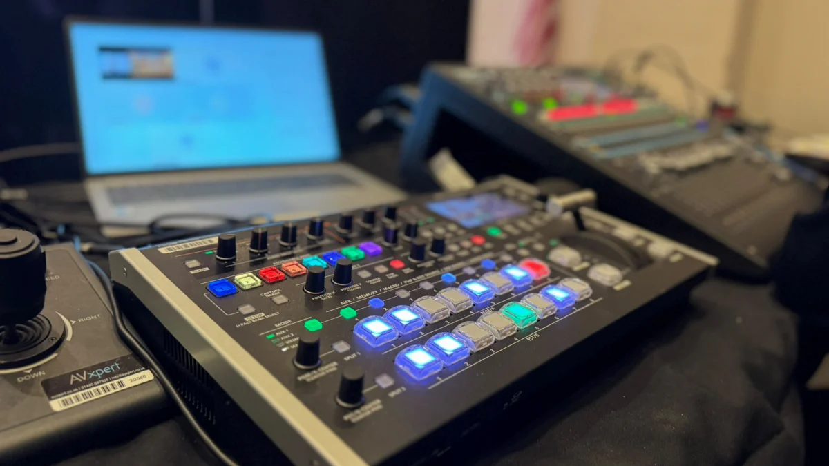 A close-up of the Roland vision mixer and camera controller at the Family First event