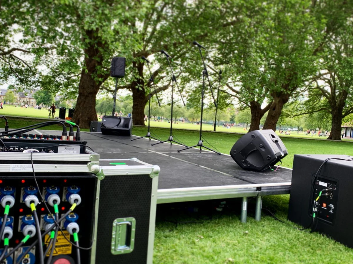 A power distribution rack beside the stage at the Cambridge Dragon Boat Festival