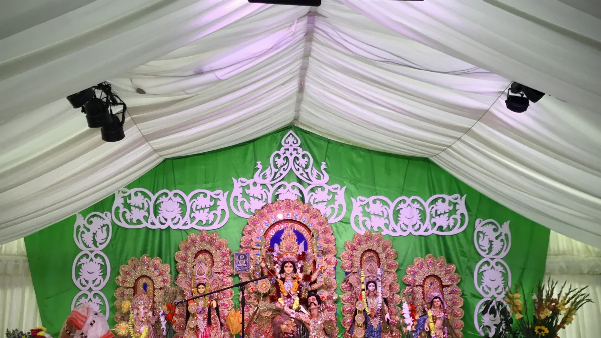 A Durga Puja festival marquee in Milton Keynes, lit by AV Xpert