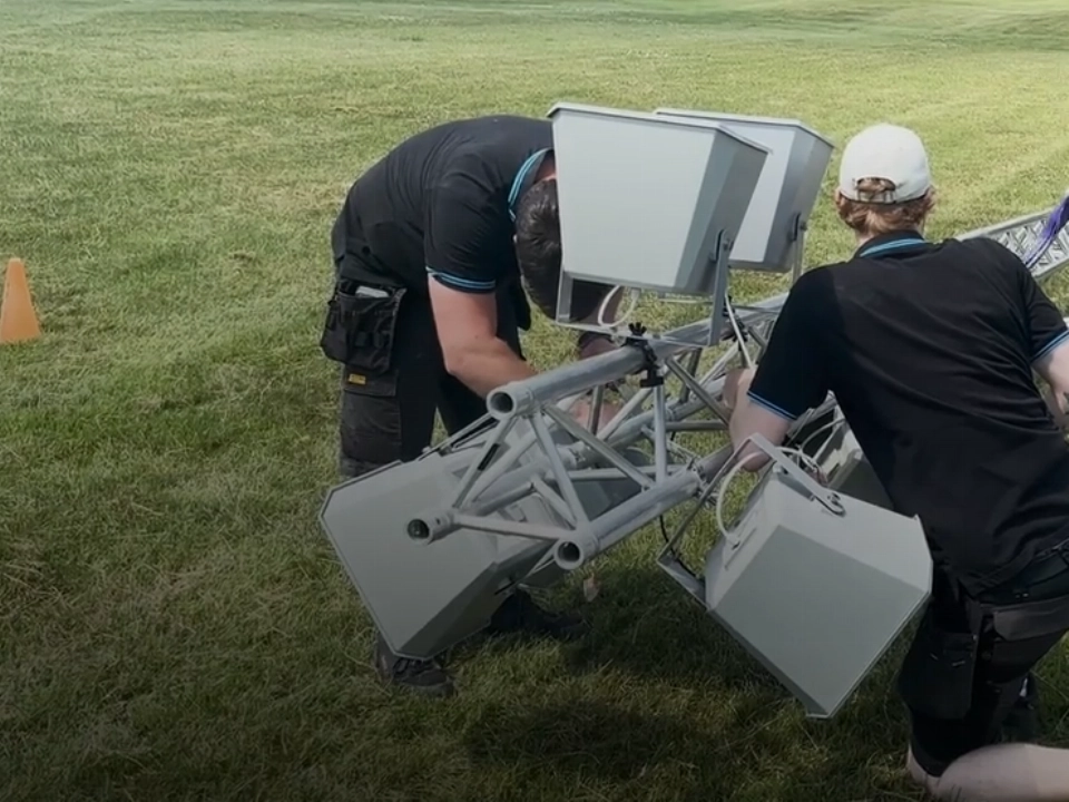 AV Xpert technicians setting up speakers at the RREC Annual Rally