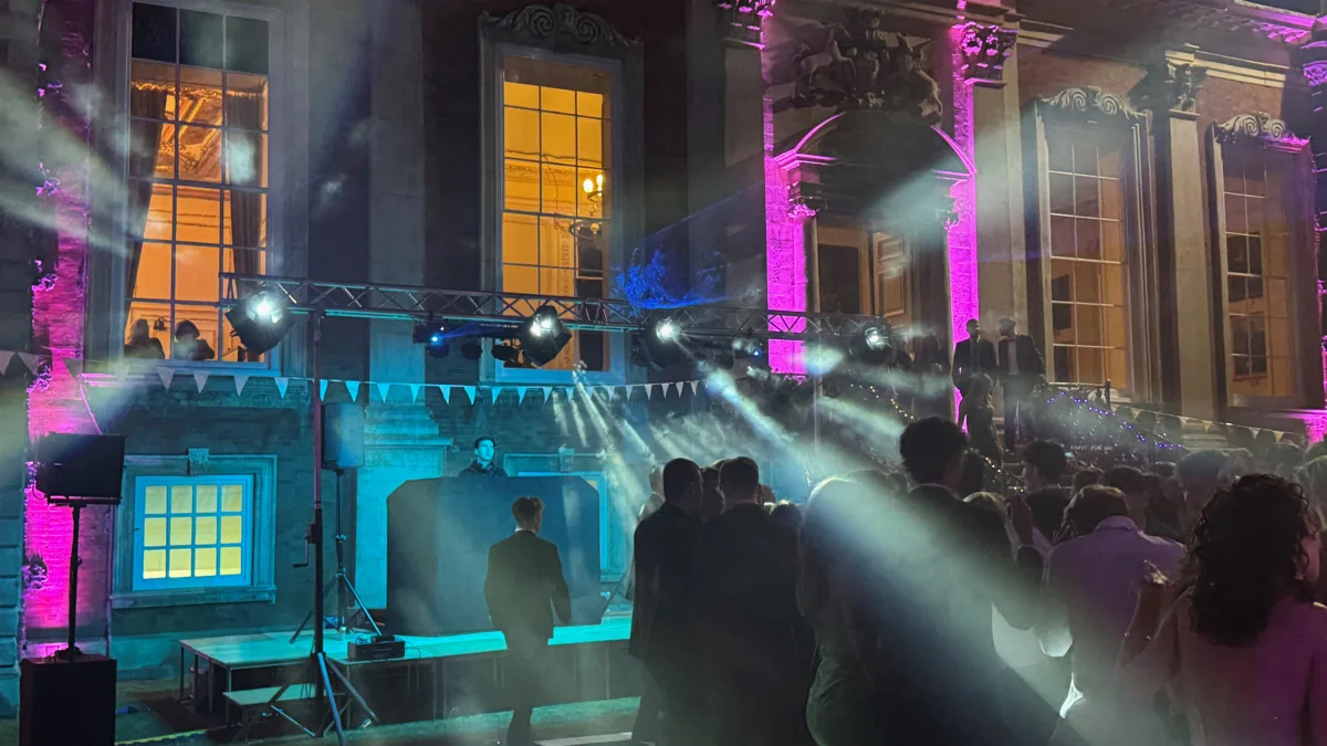 A school ball dance floor with lighting and a DJ set-up from AV Xpert