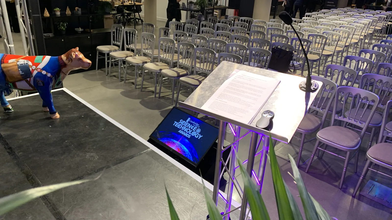 The lectern, confidence monitor and stage that AV Xpert set up for the Cambridge Science and Technology Awards