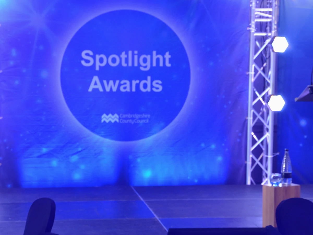 The branded backdrop and truss lighting at the Spotlight Awards